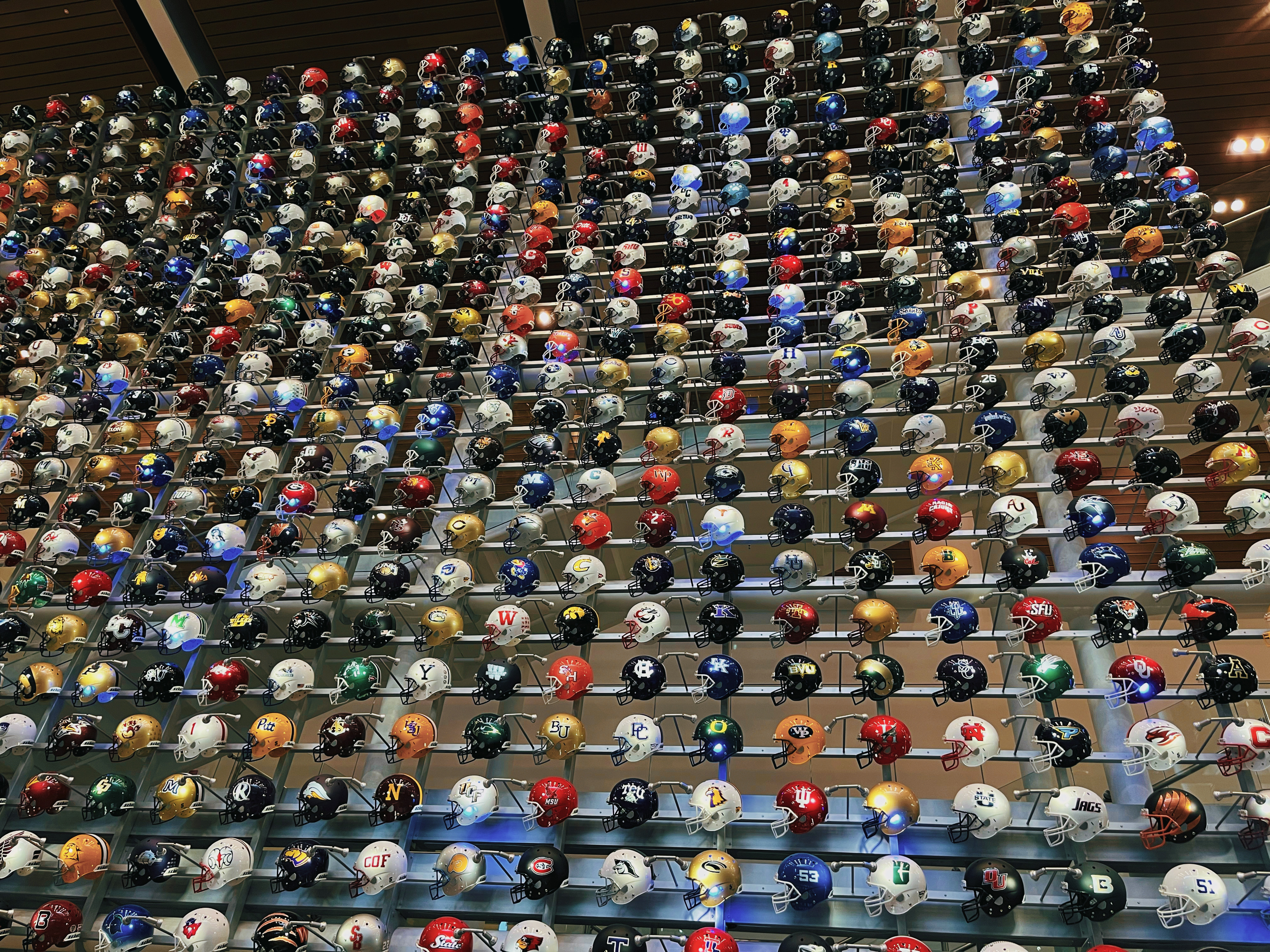 Wall of College Football Helmets