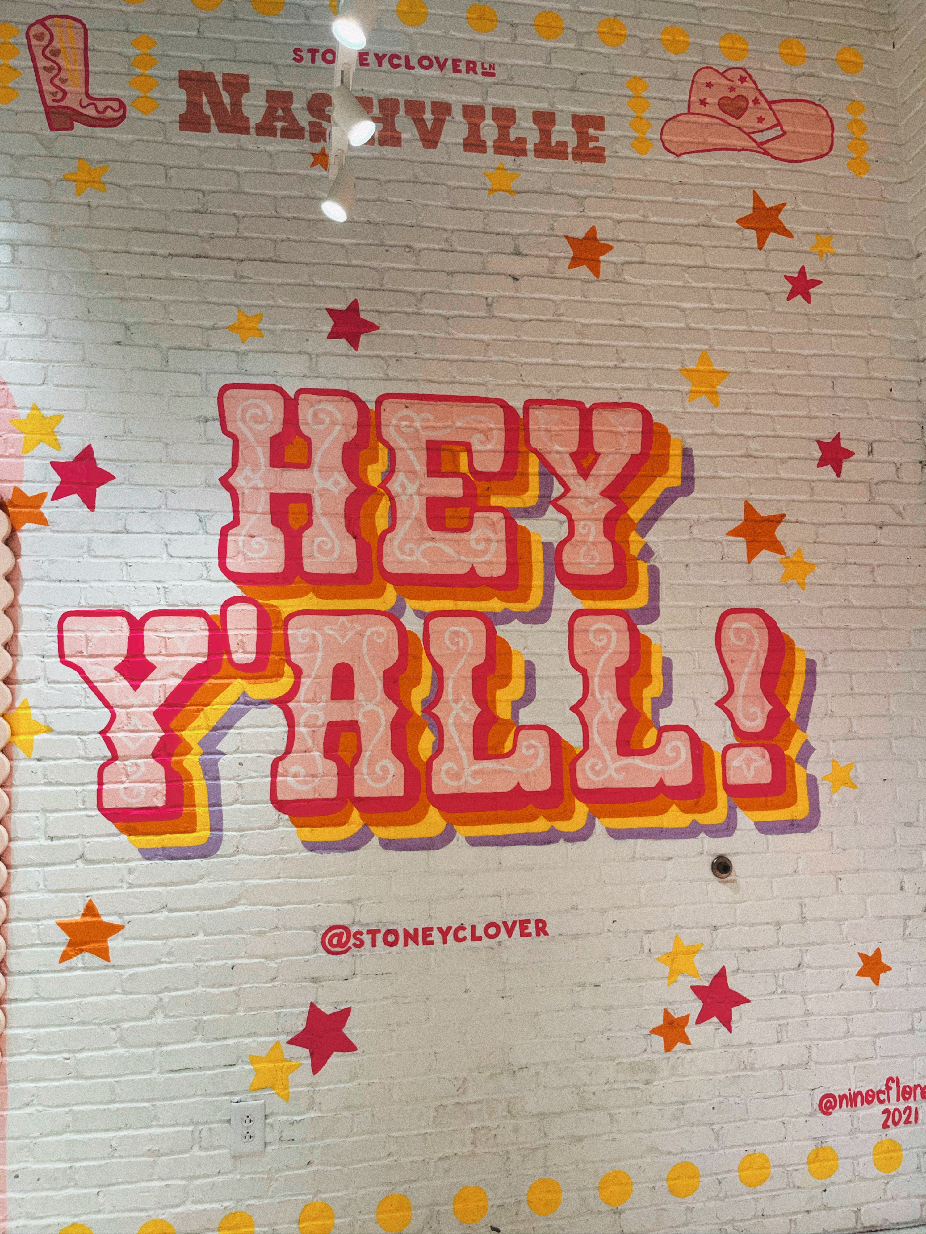 cute pink Hey Y'all! Mural located inside Stoney Clover 