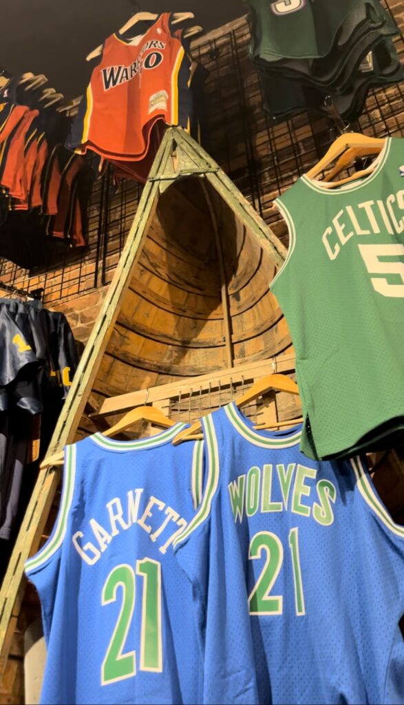 Basketball jerseys hanging on the walls inside The Vault in Greenville, South Carolina