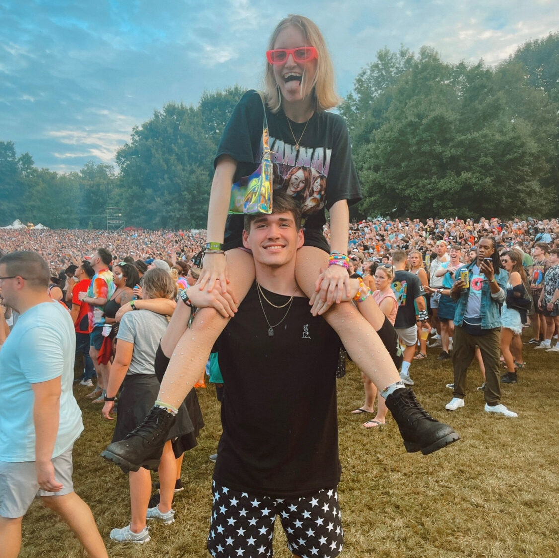 couple at Music Midtown with a girl on the boys shoulders