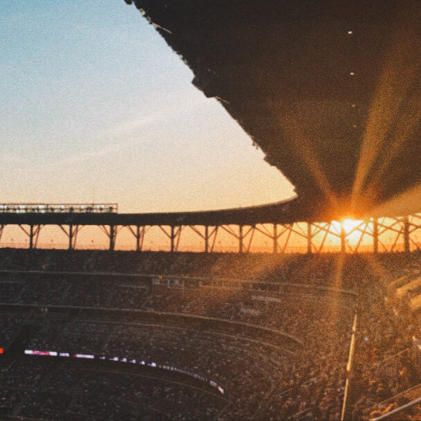 the sun setting behind Truist Park, where the Atlanta Braves play baseball