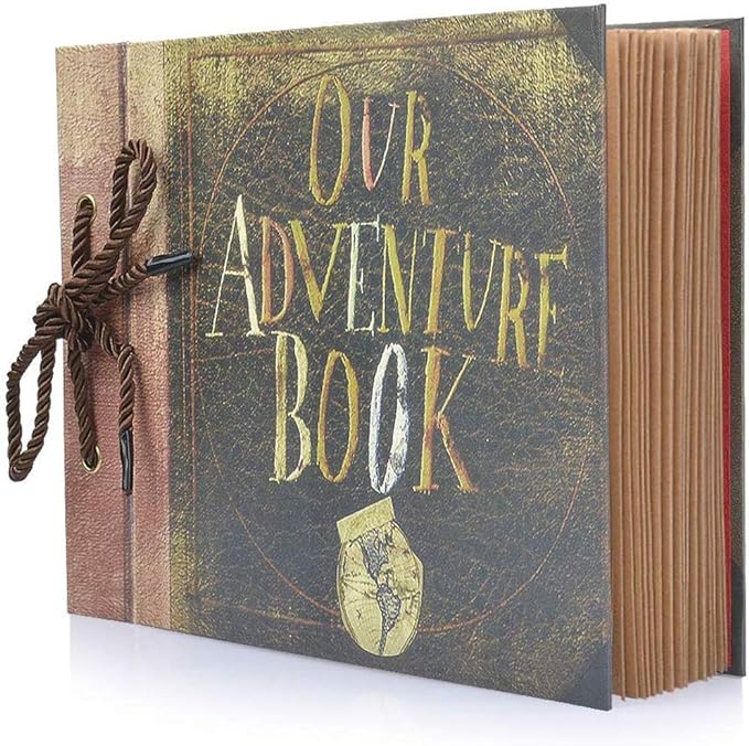 A Scrapbook That Says "Our Adventure Book" As Seen In The Movie, Up