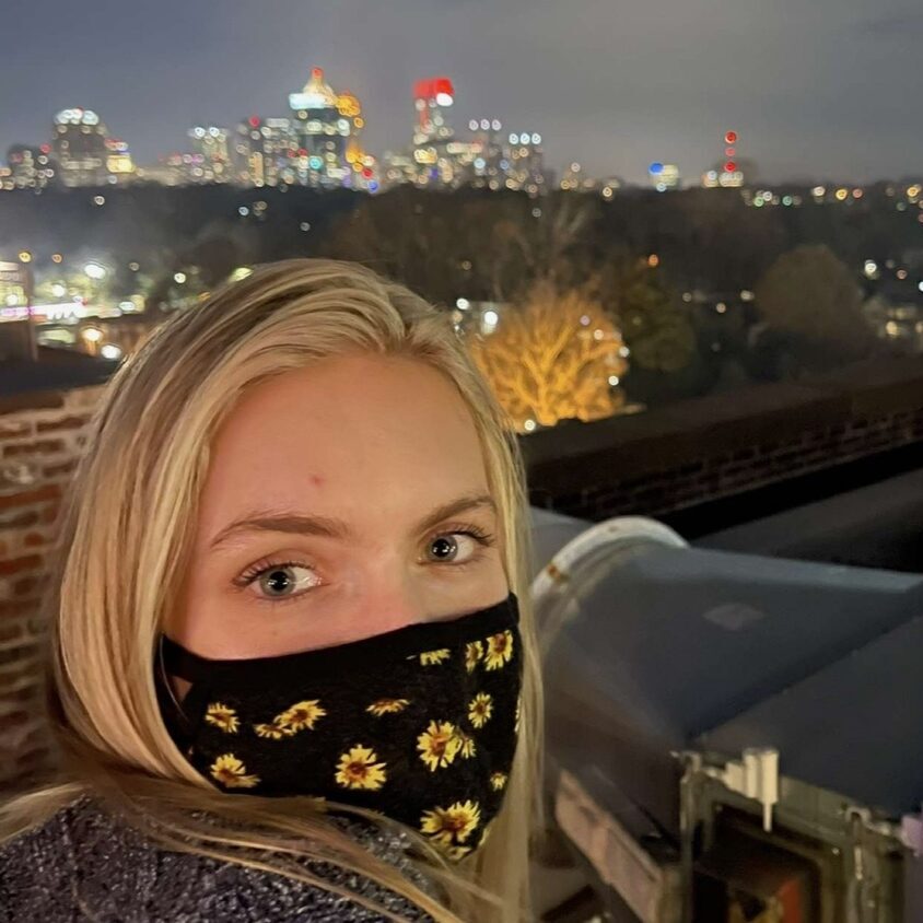 Me infront of the view of the Atlanta skyline seen from the Roof at Ponce City Market
