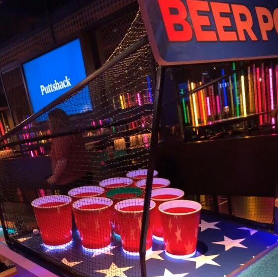 a putt putt hole that looks like beer pong at Puttshack 