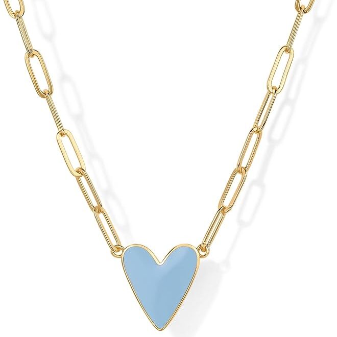 a gold necklace with a light blue heart