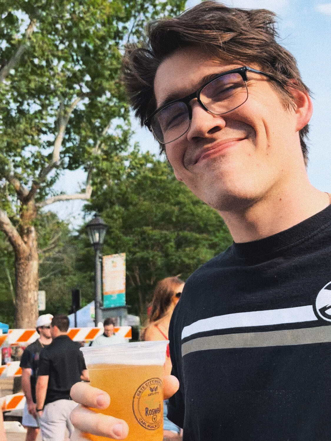 my boyfriend holding a beer from Alive After 5