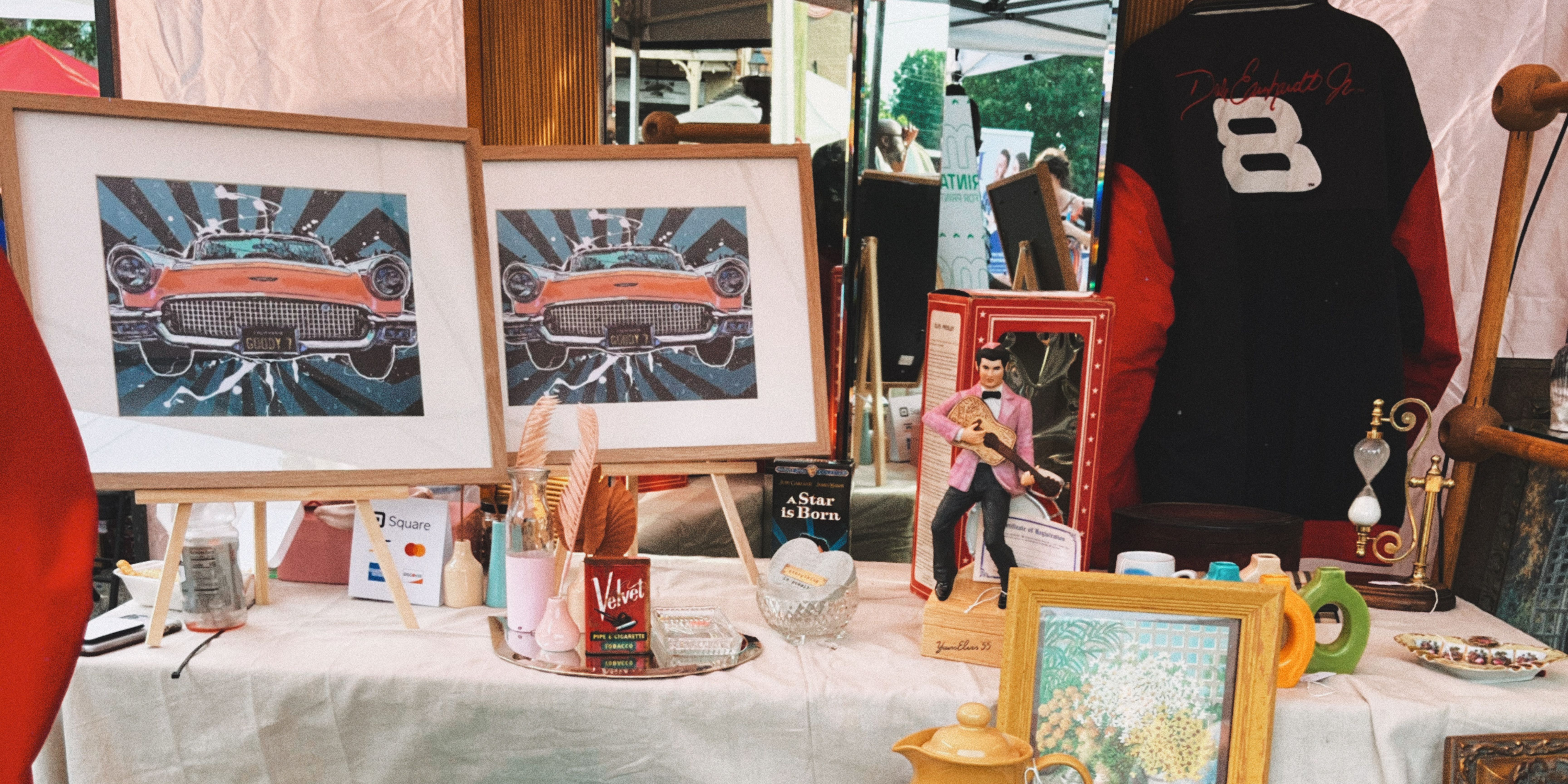 booth at Alive After selling vintage goods like shoes, art,  suitcases, and sportswear