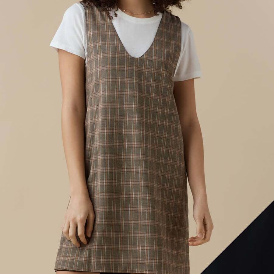 a reversible plaid dress from Vetta. One side is brown and the other is black