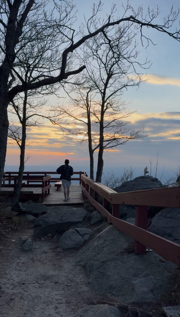 Man walking up to Fort Mountain West Overlook